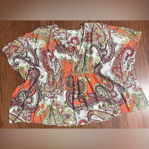 Unique blouse with key hole in front and cinched waist